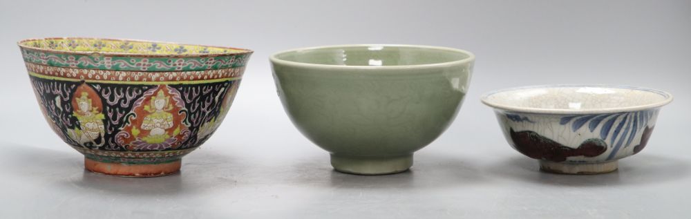 A Chinese celadon bowl, a Thai market famille rose bowl and a crackle glaze bowl